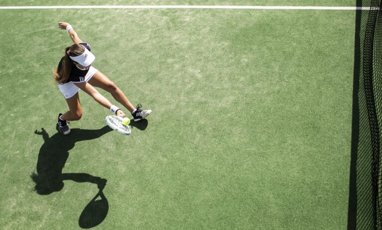 Padel player making a common mistake by standing too close to the net during a doubles match